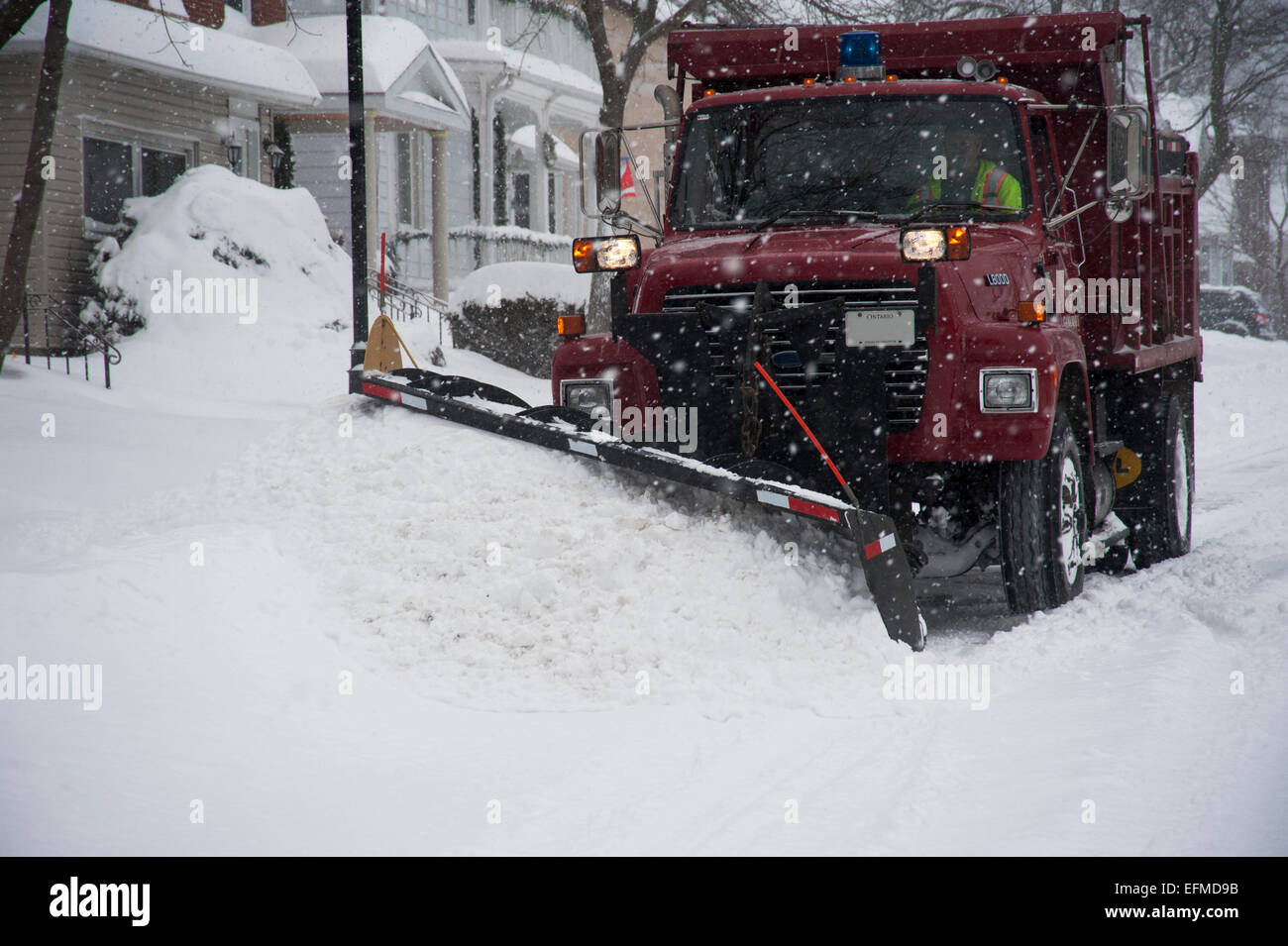 Snow removal truck plowing the road in winter, Gananoque, Ontario, Canada Stock Photo Alamy