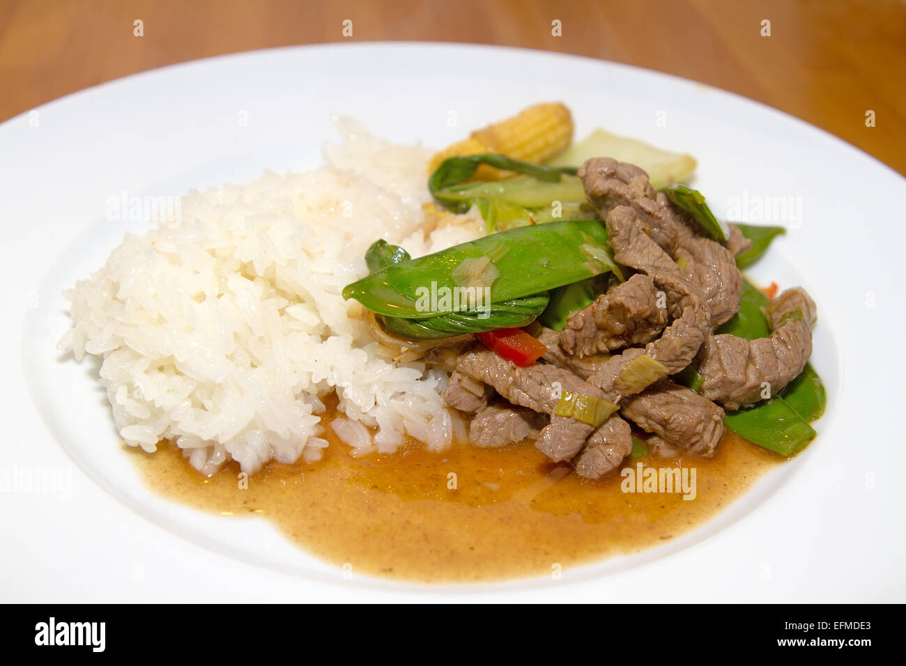 Asian vegetable stir-fry with beef strips Stock Photo