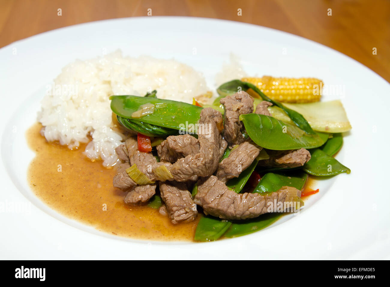 Asian vegetable stir-fry with beef strips Stock Photo