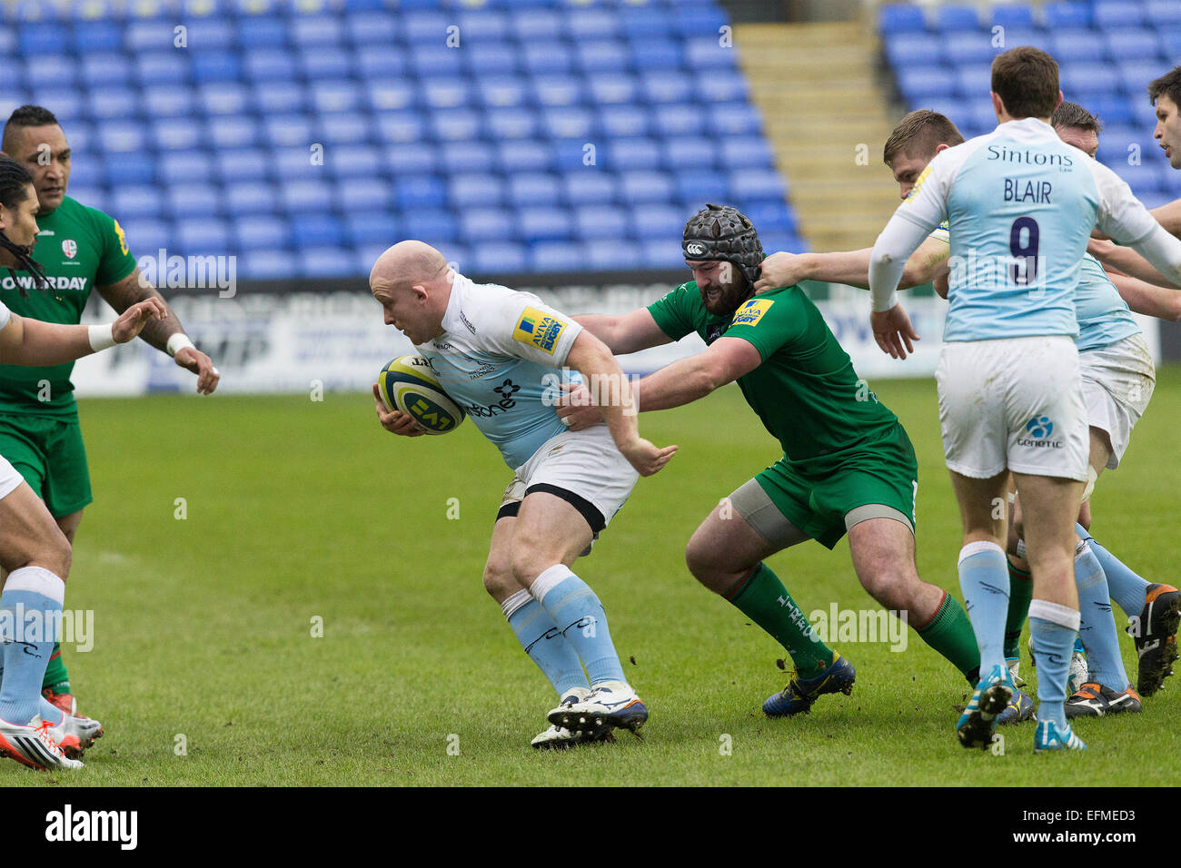 Reading, UK. 07th Feb, 2015. LV= Cup Group Stages. London Irish versus Newcastle Falcons. Scott Lawson is tackled by Jimmy Stevens. Credit:  Action Plus Sports/Alamy Live News Stock Photo