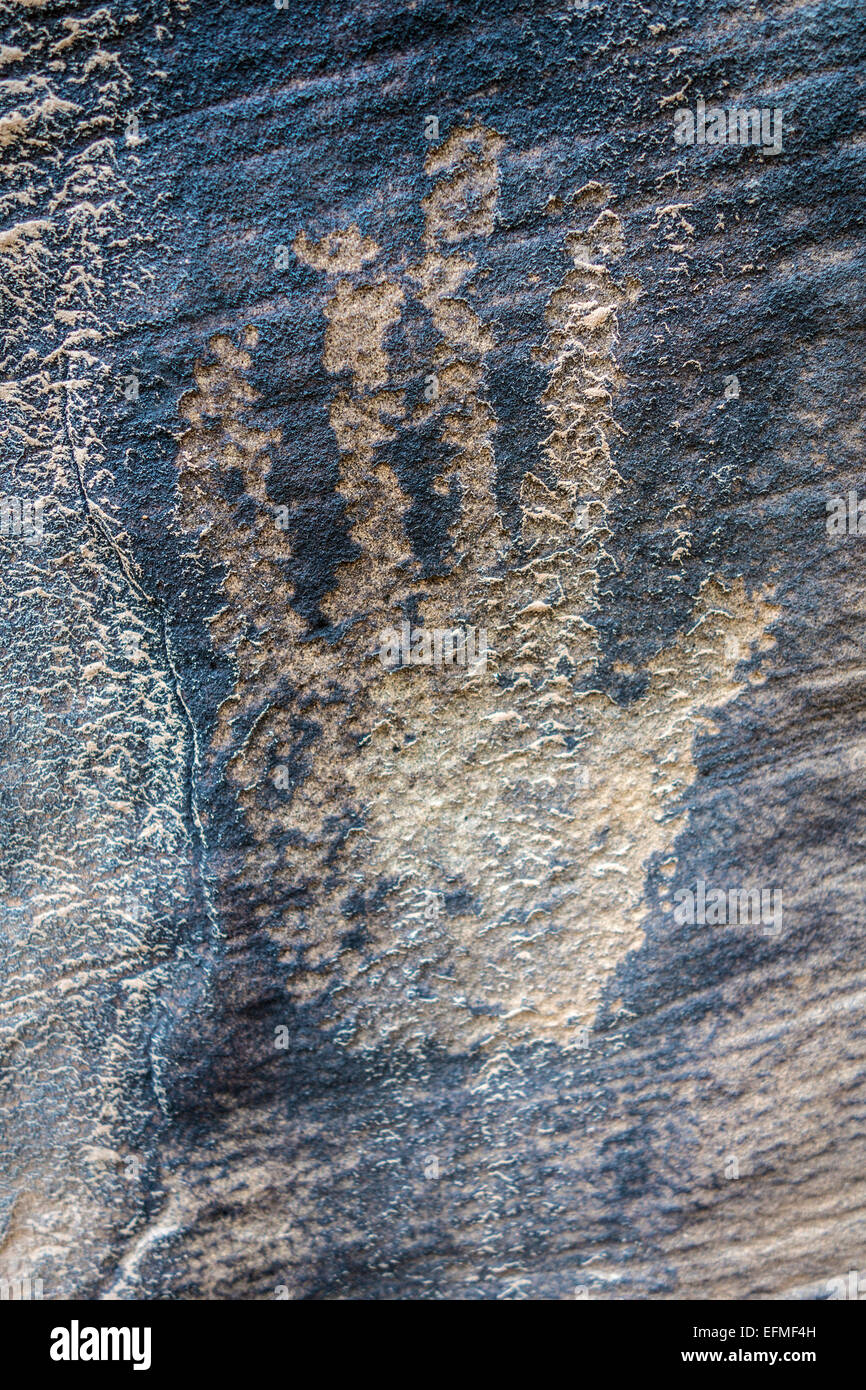 Ancient Hand petroglyph in the American Southwest. Stock Photo