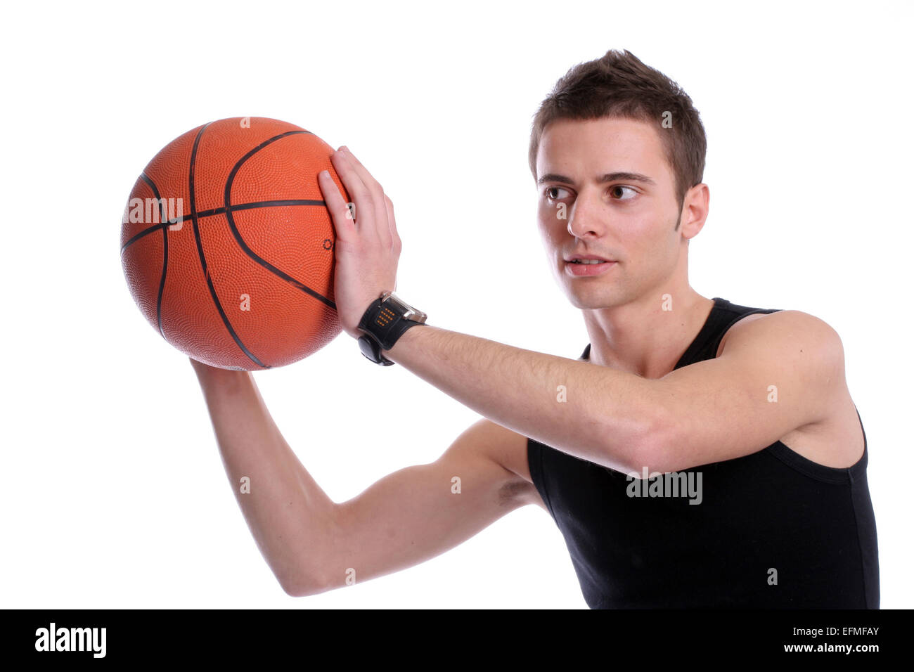 Causal man holding basketball ball, isolated on white background Stock Photo