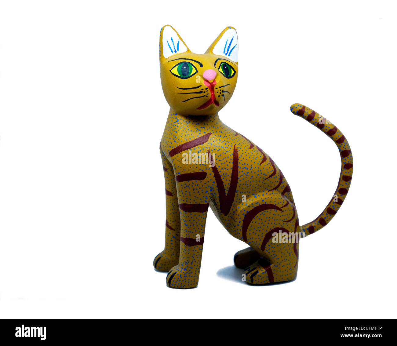 Indigenous Mexican handcrafted wooden cat figurine cut-out. Stock Photo