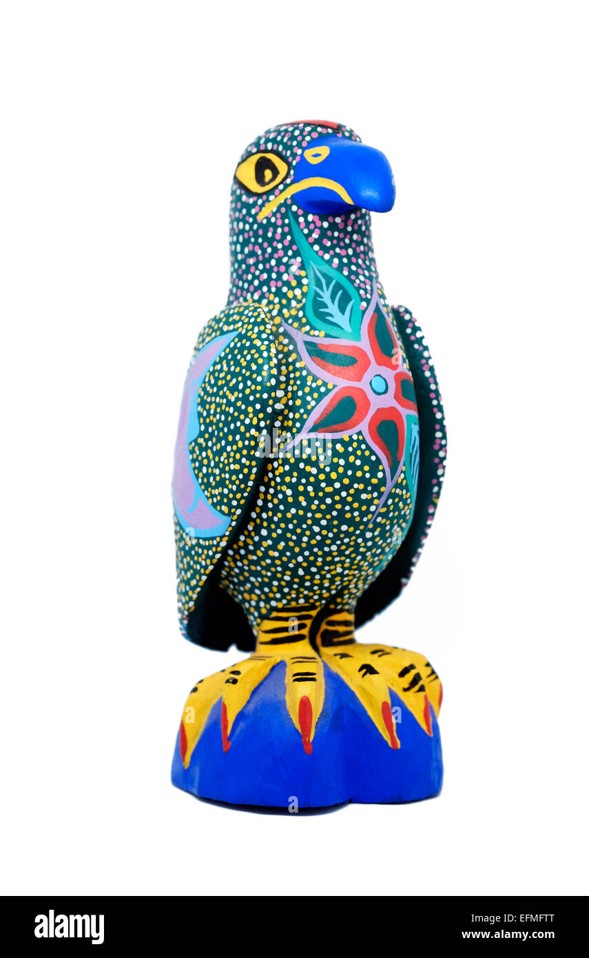 Mexican Eagle wooden painted figurine. Indigenous handcrafted Stock Photo