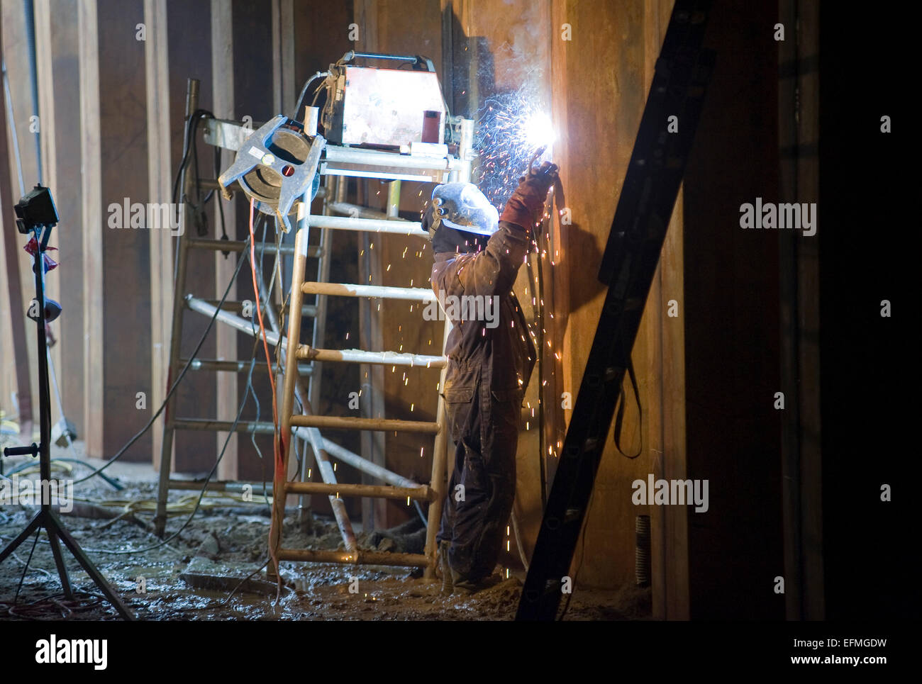 ENSCHEDE, THE NETHERLANDS - 27 OKT, 2014: Welder at work on a construction site Stock Photo