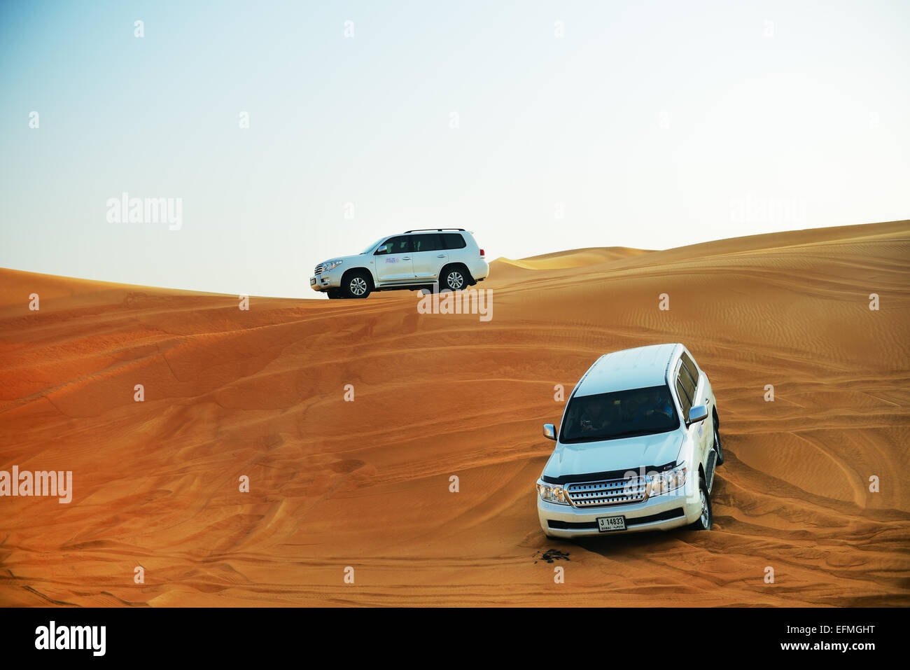 The Dubai desert trip in off-road car is major tourists attraction, UAE Stock Photo