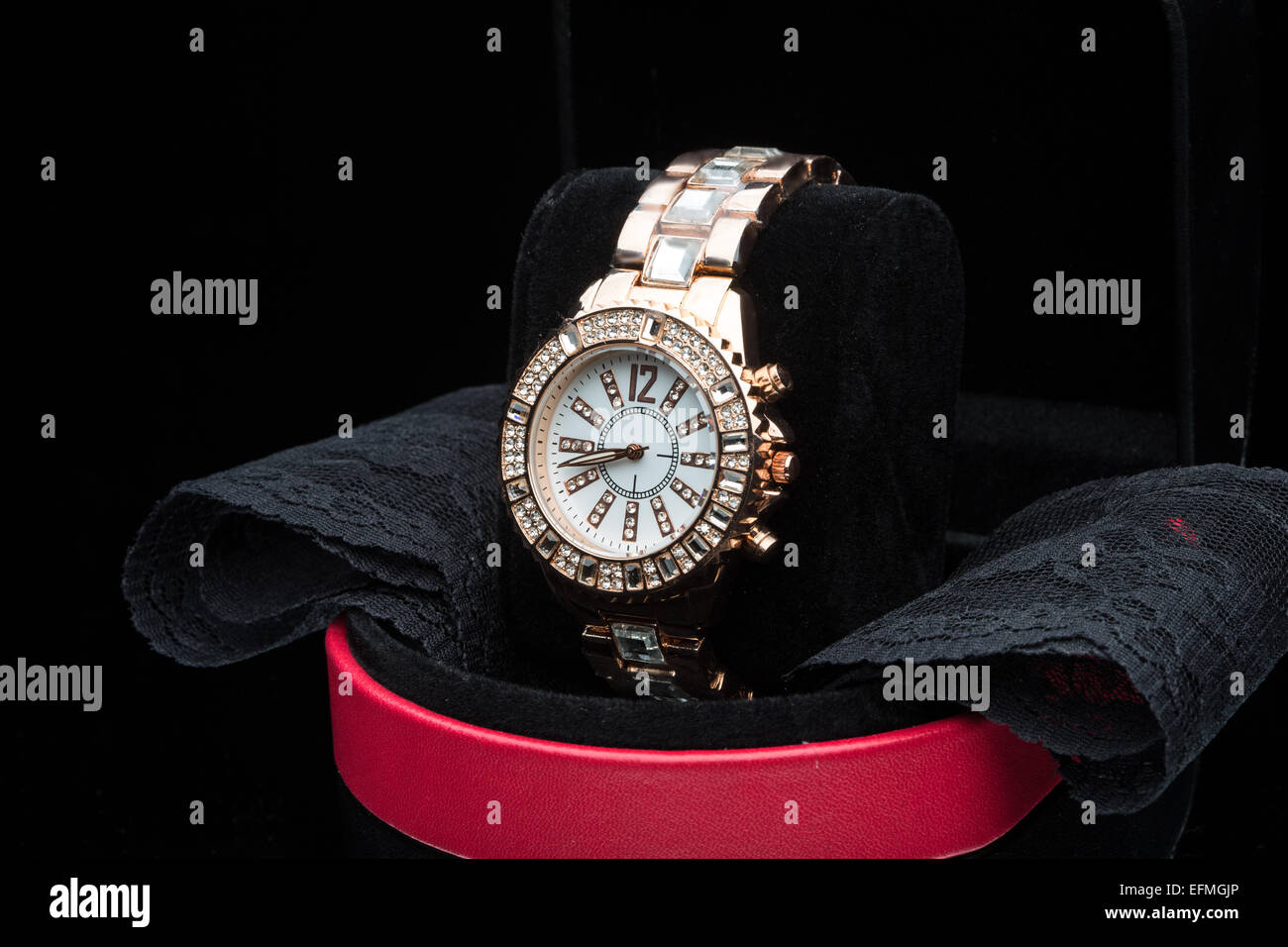 gold watch isolated on black background Stock Photo - Alamy