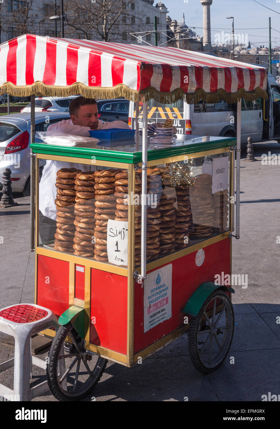 Simit bread vendor on the quay at Eminonu by Galata bridge,Istanbul, Turkey. Stock Photo