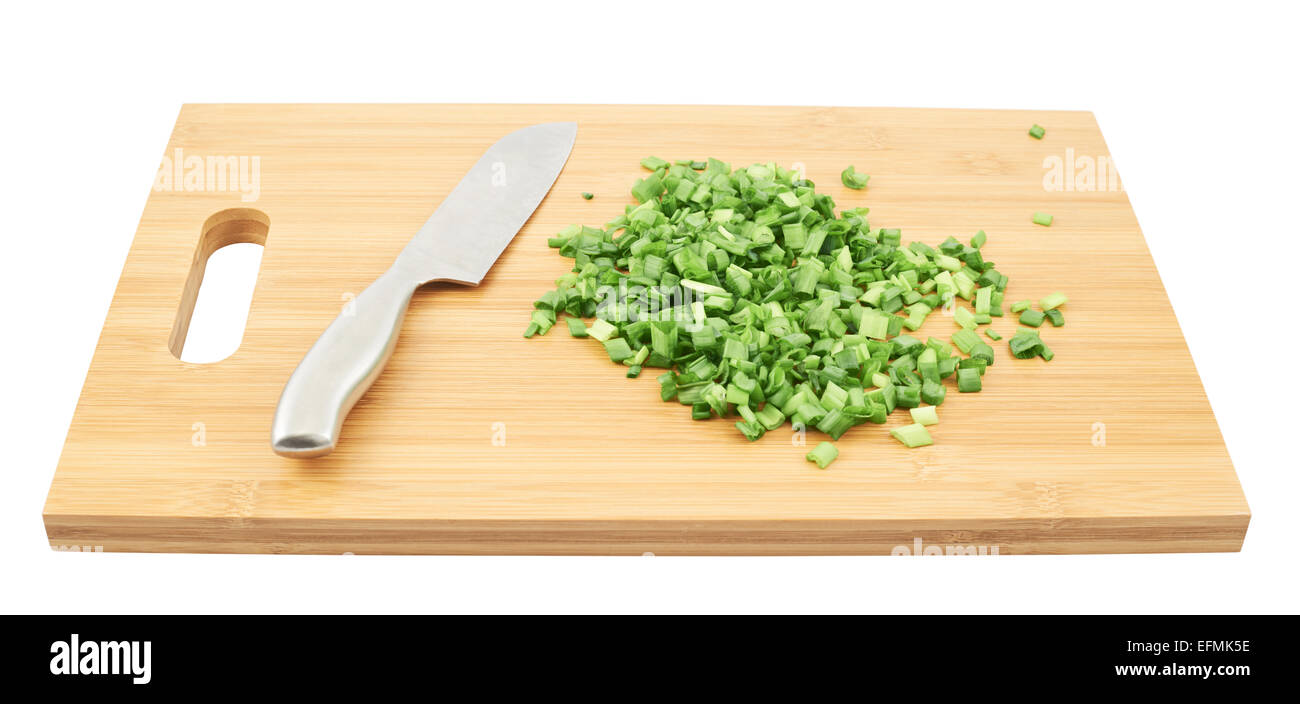 Cut in pieces green onion over cutting board Stock Photo - Alamy