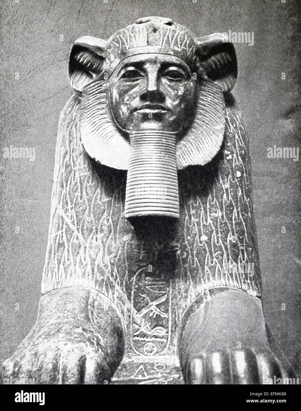 This Hyksos sphinx dates to Egypt's 12th Dynasty (c. 1991-1786 B.C.) and was found in Tanis. The noted French archaeologist Auguste Mariette wrote in 1863 that these black granite sphinxes 'differ from other Egyptian monuments in a very marked way as one sees by comparing them with the Sphinx of Tutmes III and Ramses II. The face is round, the eyes are small, the nose flattened, the cheek bones projecting, the lower lip slightly advanced, the ears are those of a bull while the mane of a lion encircles the visage.' Stock Photo
