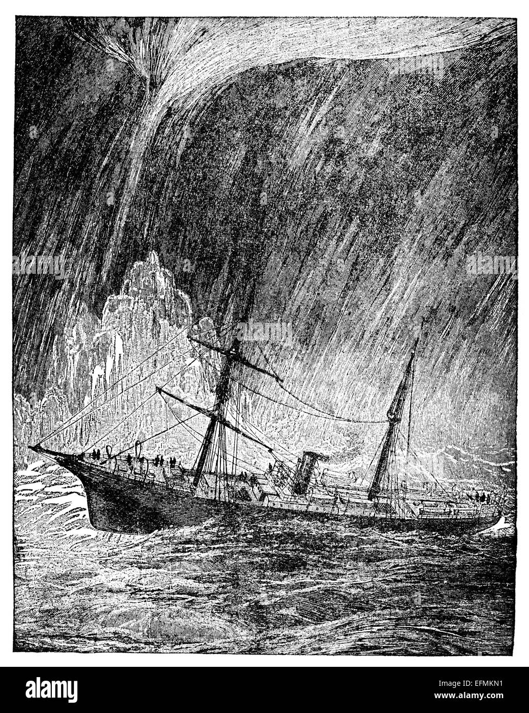19th century engraving of a steamship on a stormy ocean with a waterspout Stock Photo