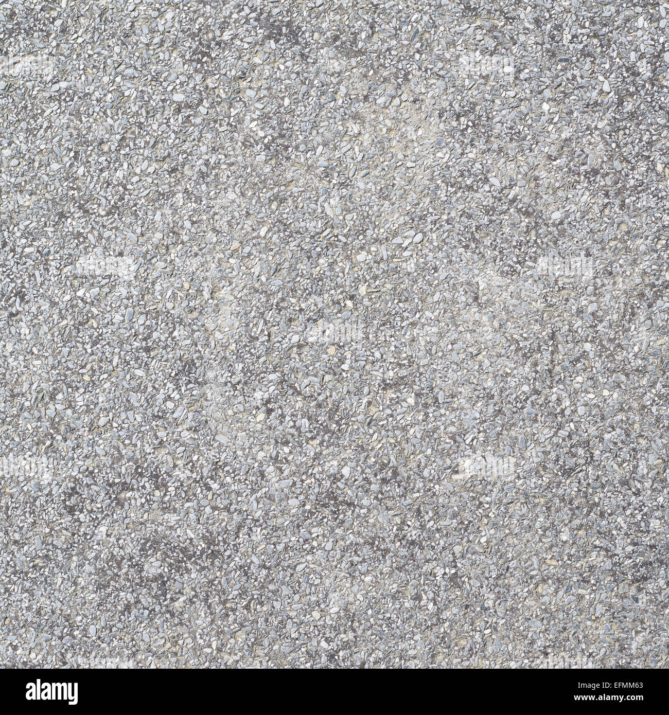 Image showcasing Concrete wall covered with pebbles Stock Photo - Alamy