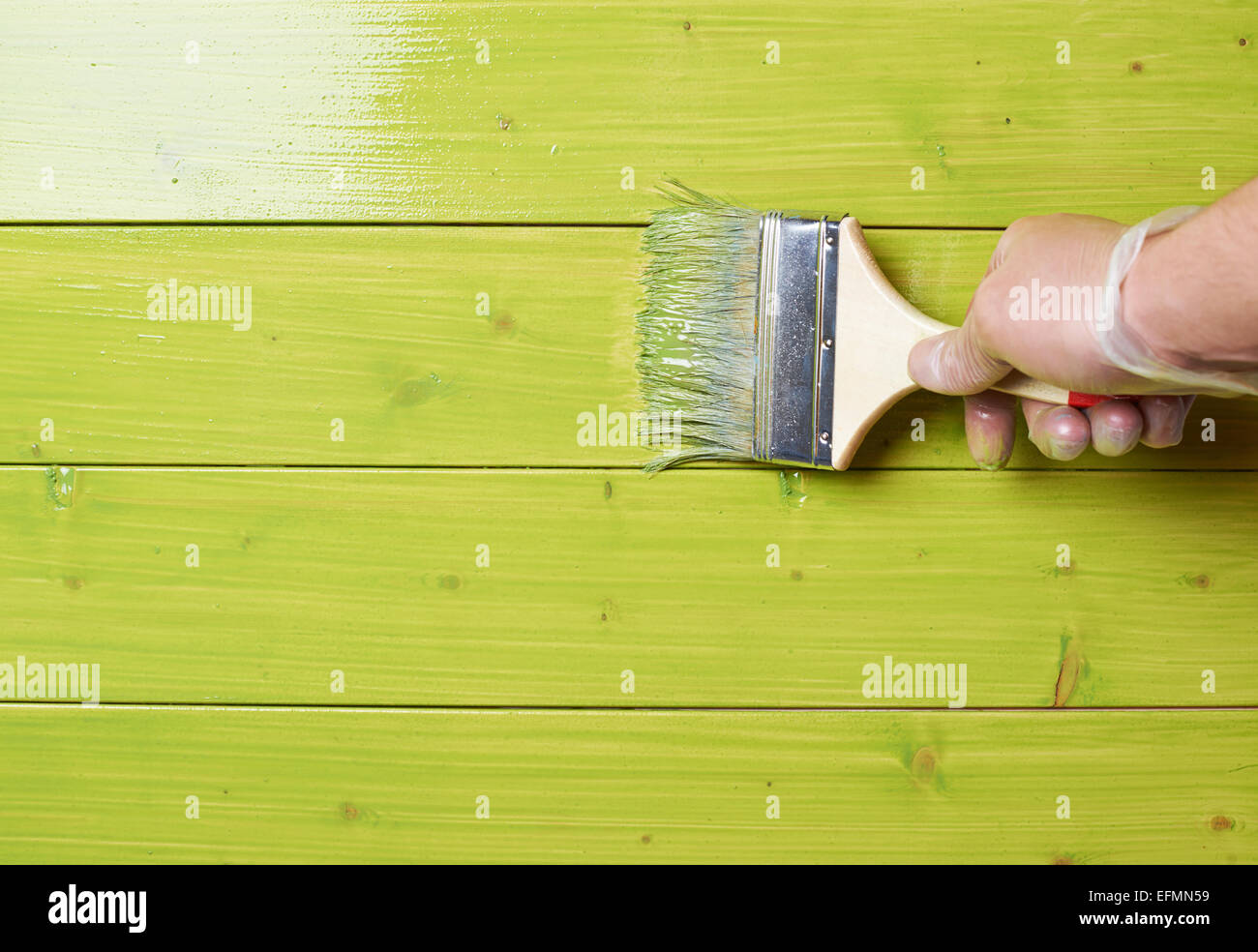 Process of painting wooden boards Stock Photo Alamy