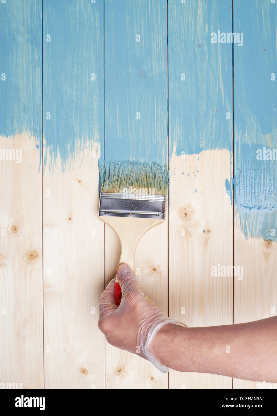 Process of painting wooden boards Stock Photo Alamy