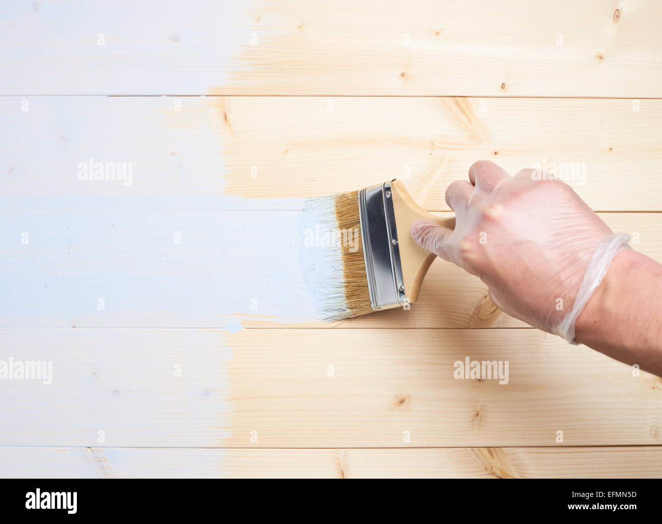 Process of painting wooden boards Stock Photo Alamy