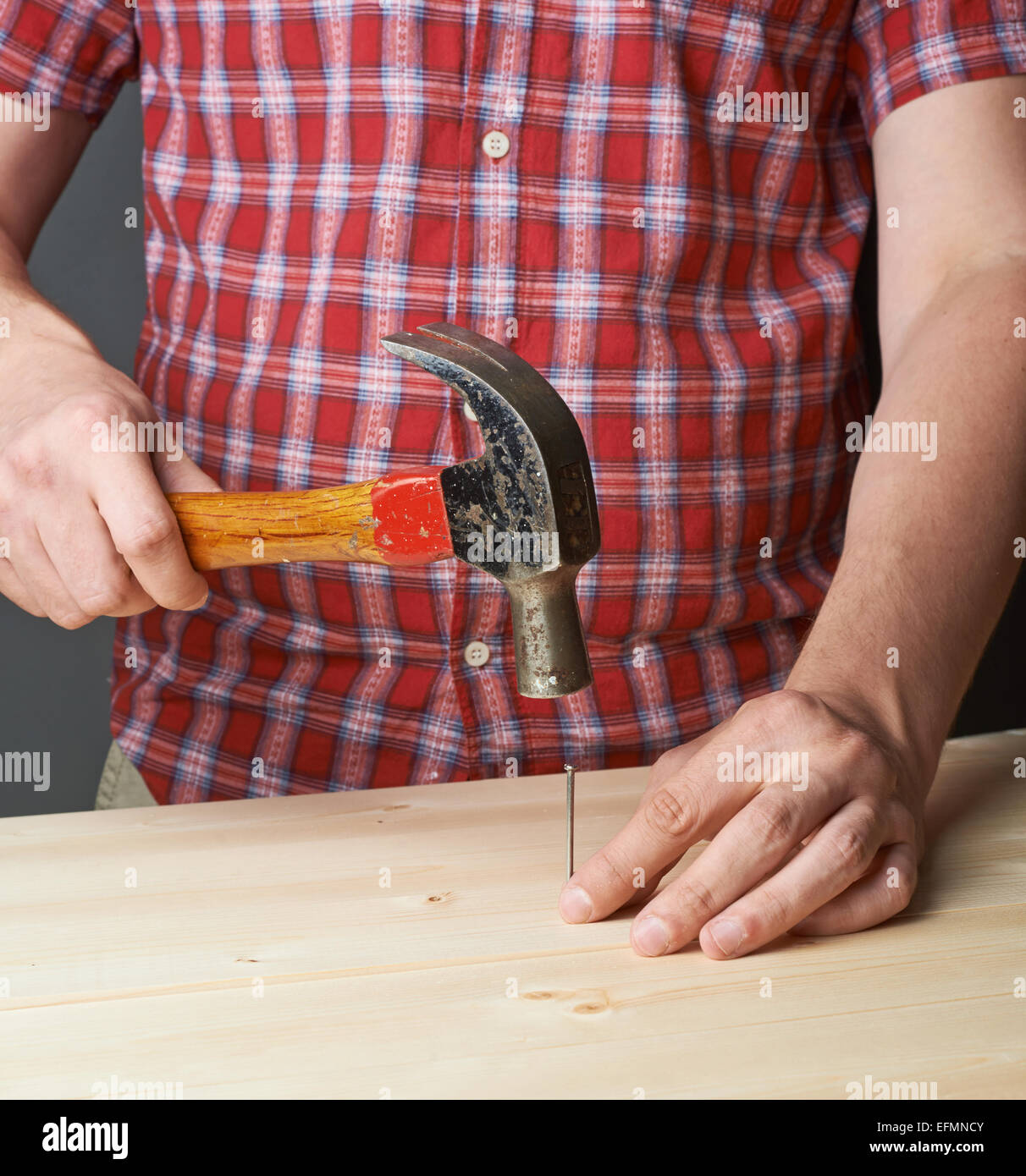 Hammering process hires stock photography and