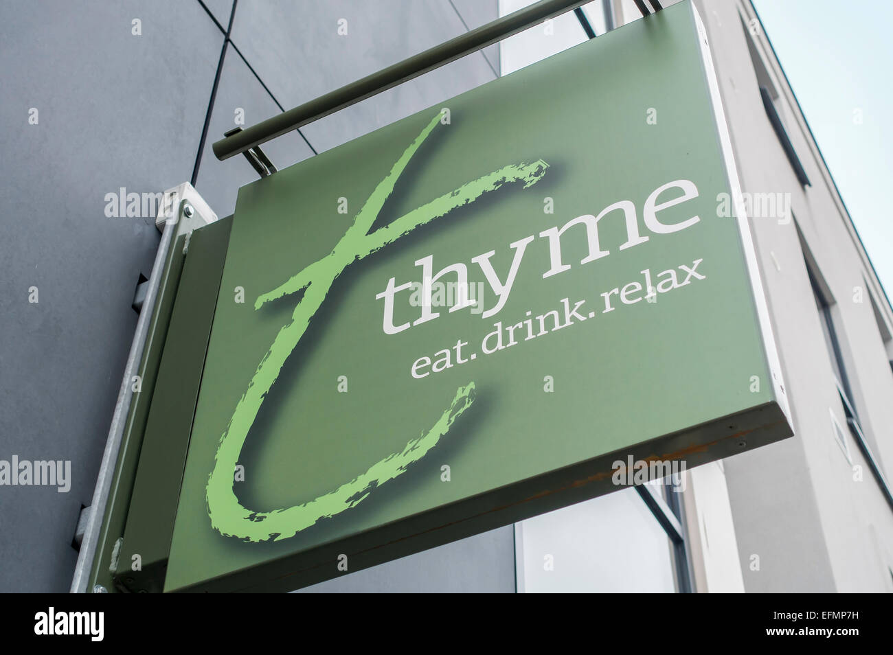 Thyme Restaurant Chain Hanging Sign  Eat, Drink, Relax Stock Photo