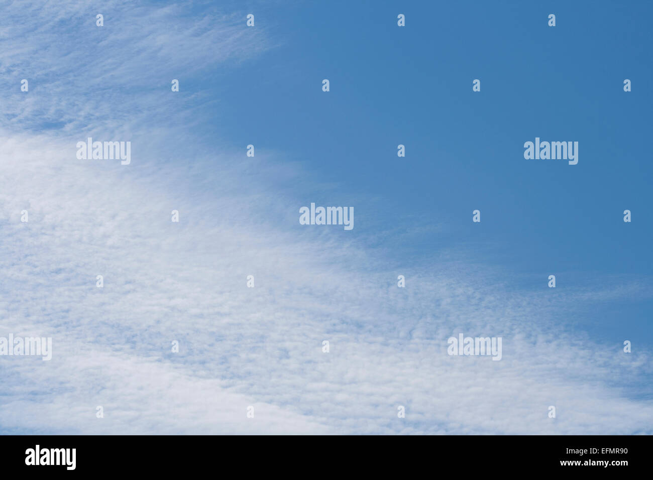blue sky and fluffy clouds background Stock Photo - Alamy