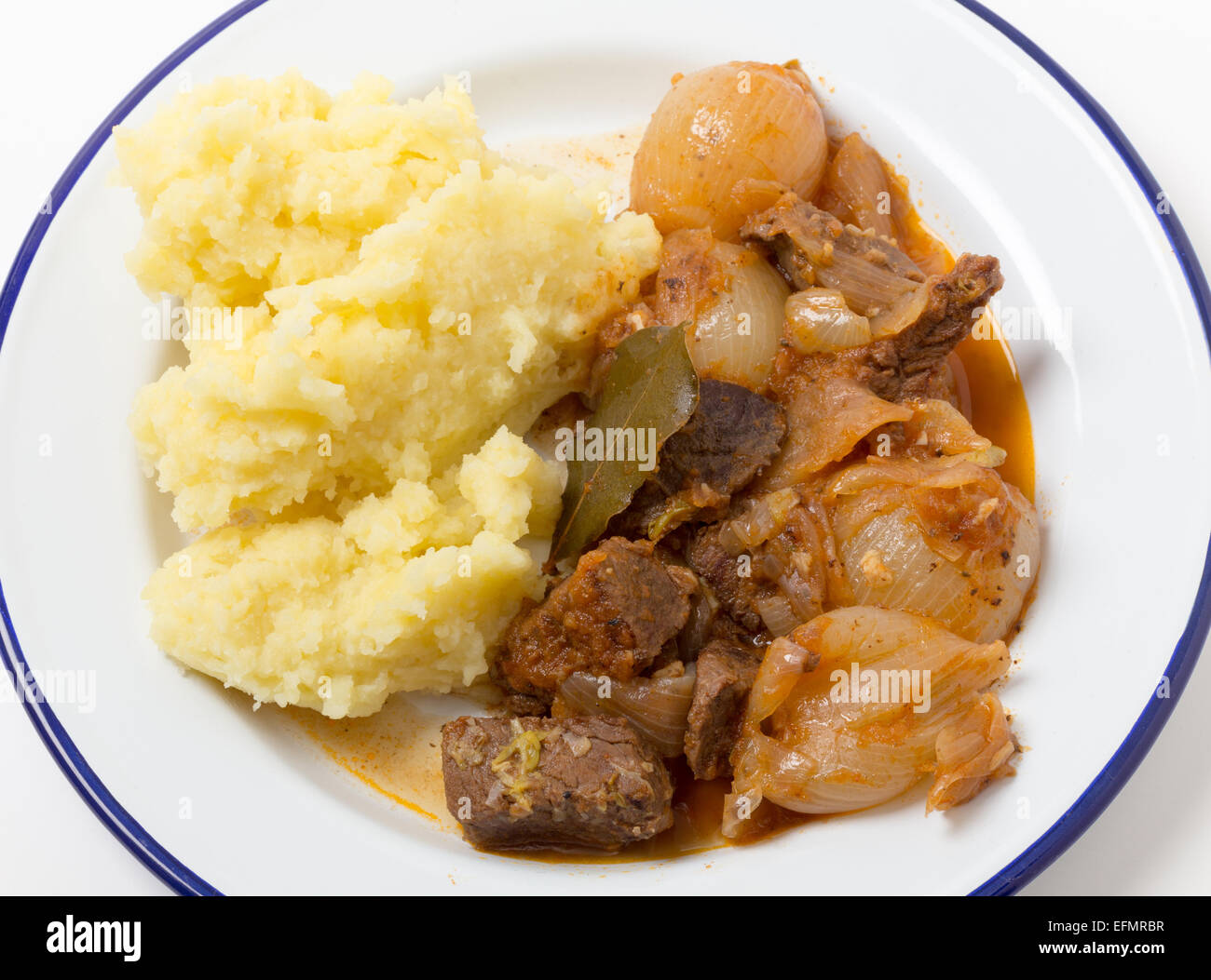 Greek traditional beef stifado, a meat and onion stew, served with