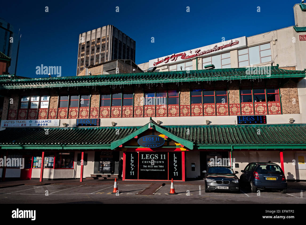 shops china town Birmingham city and home of legs 11 lap dancing club in the foreground Stock Photo