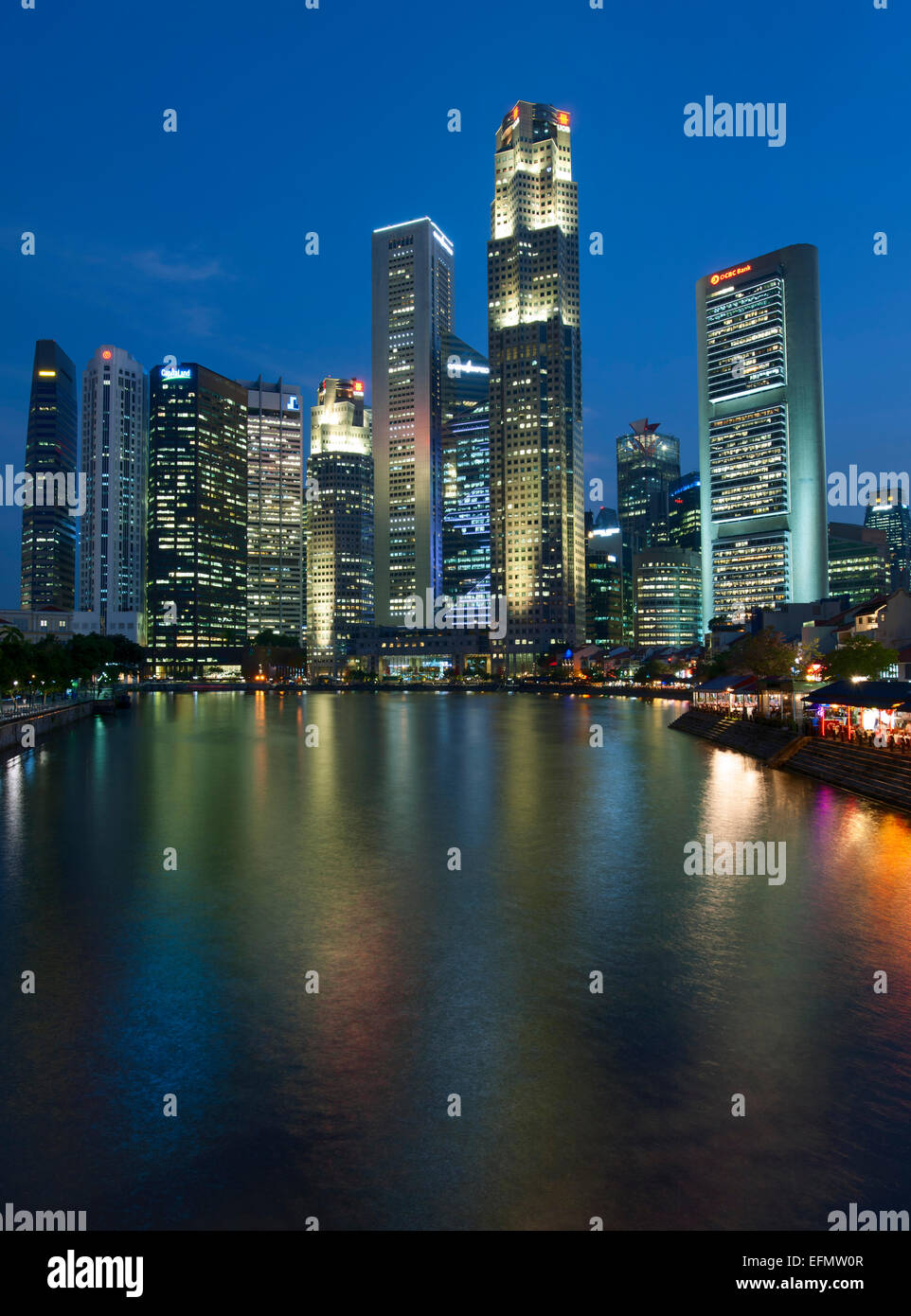 Boat Quay and the Singapore skyline and river at dusk. Stock Photo