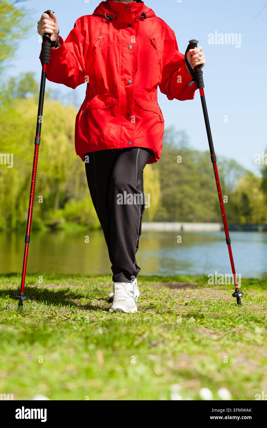 Closeup woman walking nordic sticks hi-res stock photography and images ...