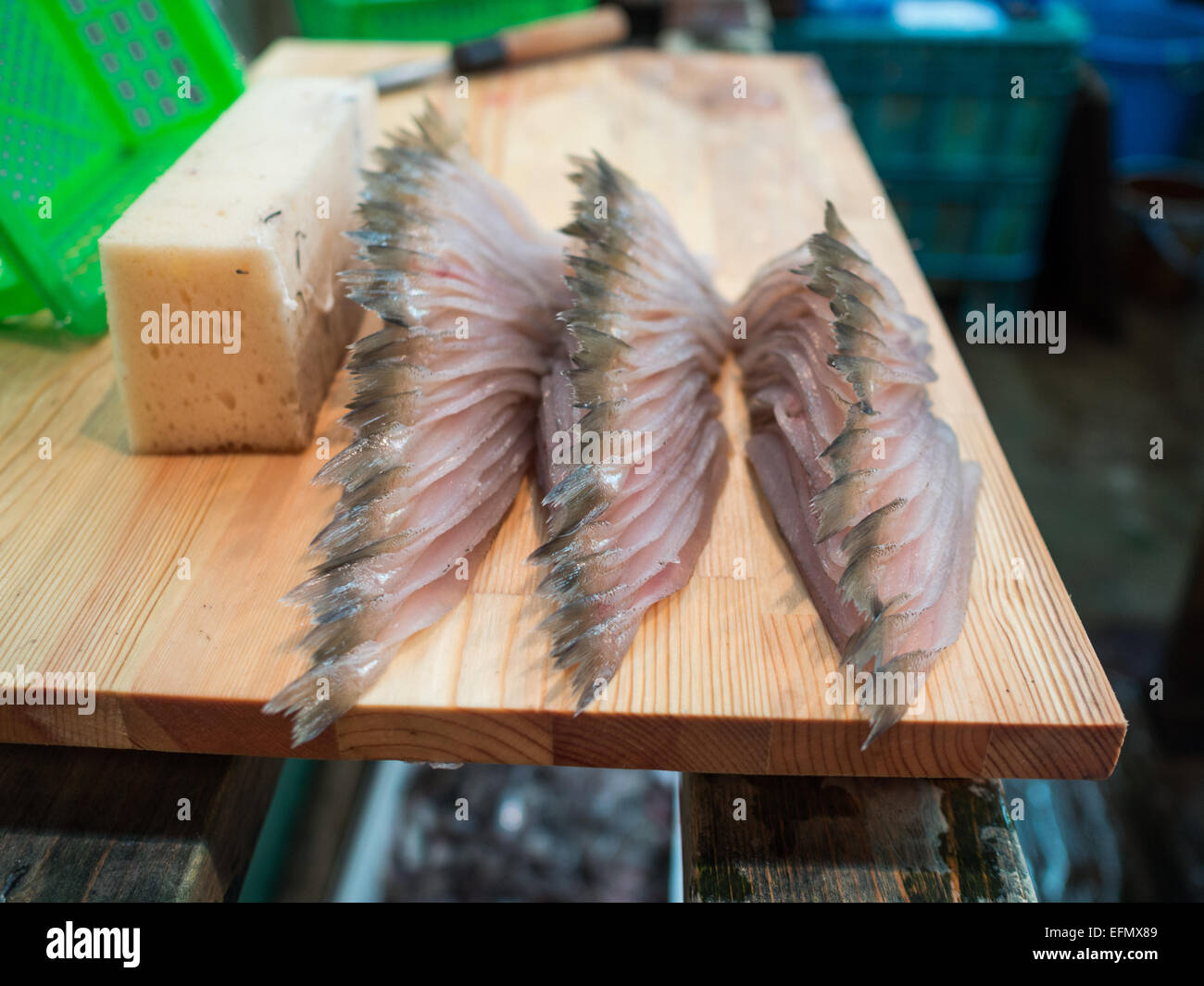 Small fish organized in piles for sale at Tsukiji market Stock Photo