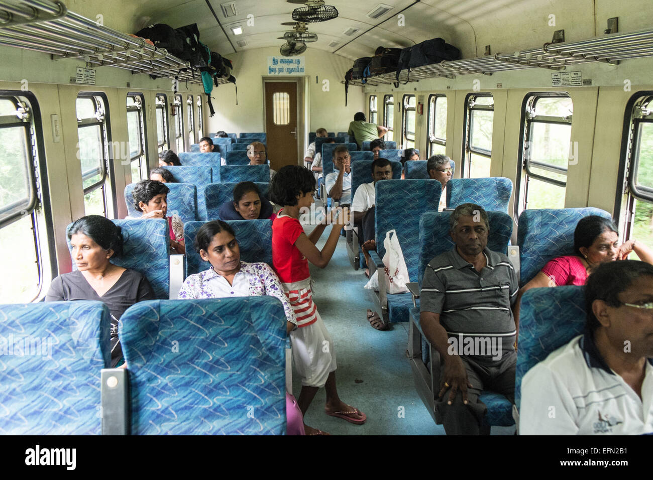 On train journey,trip, with guard,green, rural,rice fields, countryside