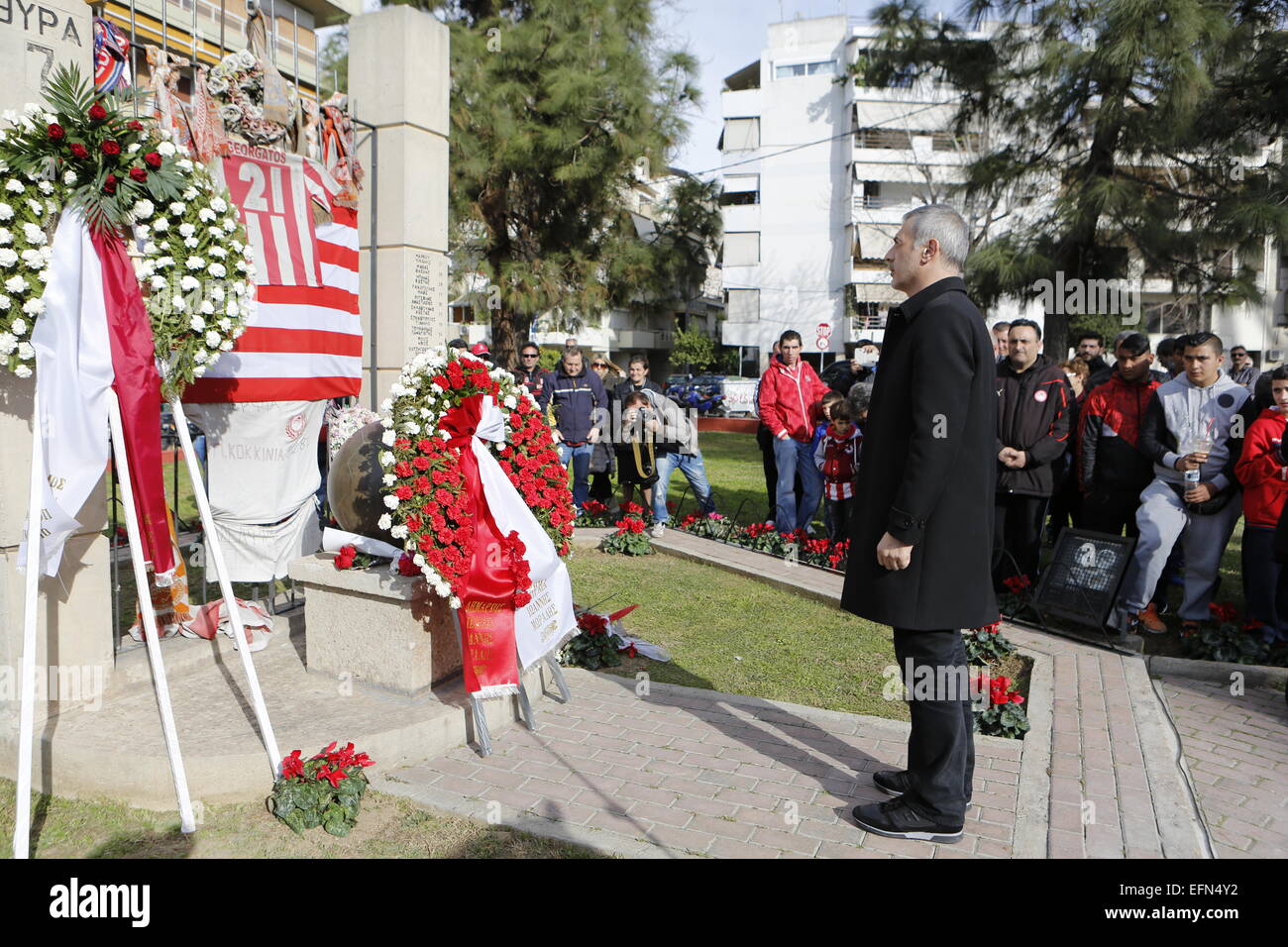 Piraeus, Greece. 7th Feb, 2015. Ioannis Moralis, the mayor of Piraeus,  remembers the victims at the memorial for the victims of the Gate 7  disaster. Hundreds of fans and official came to