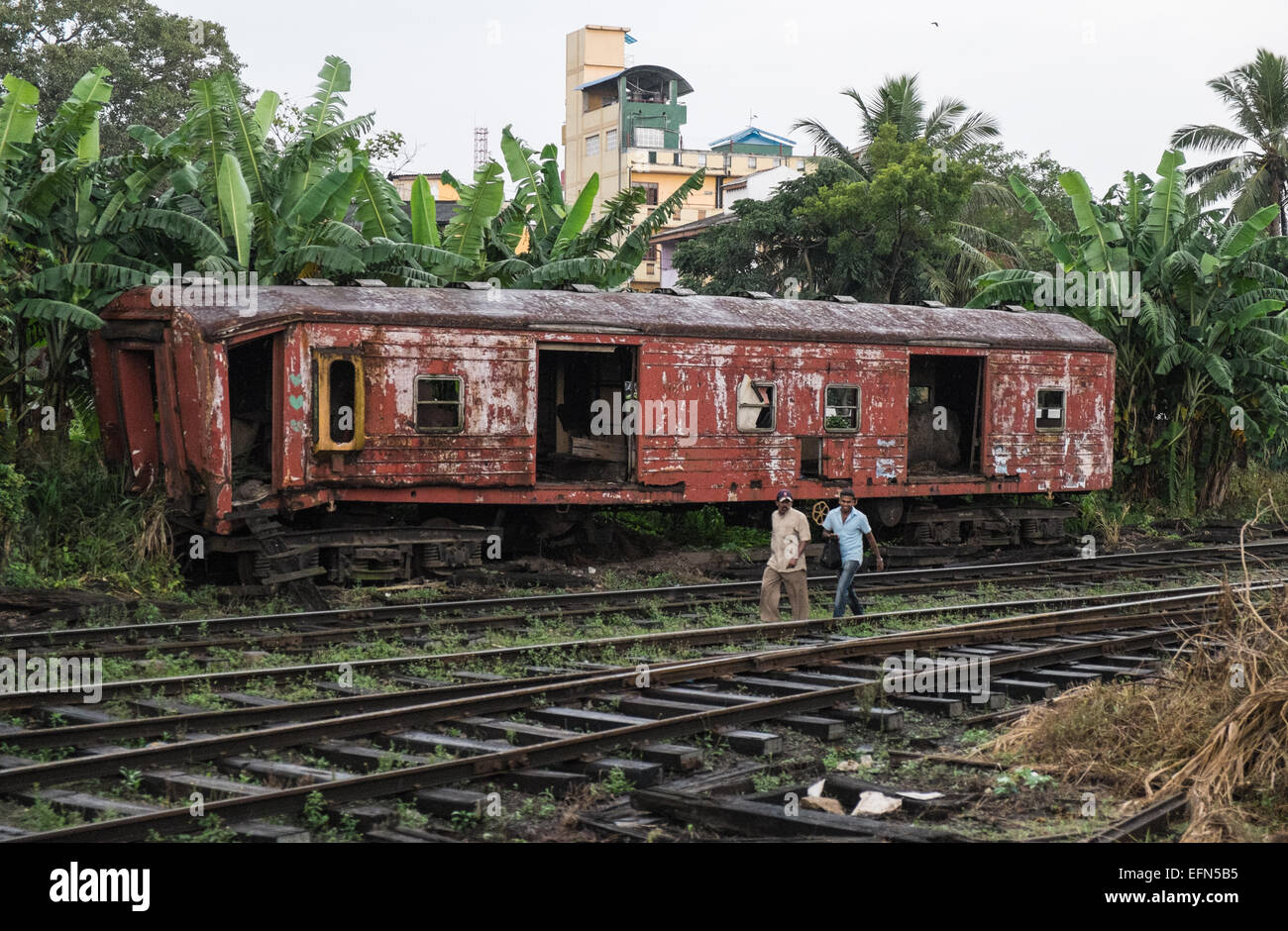 Old train carriage abandoned,unwanted,rusting rusty on tracks near