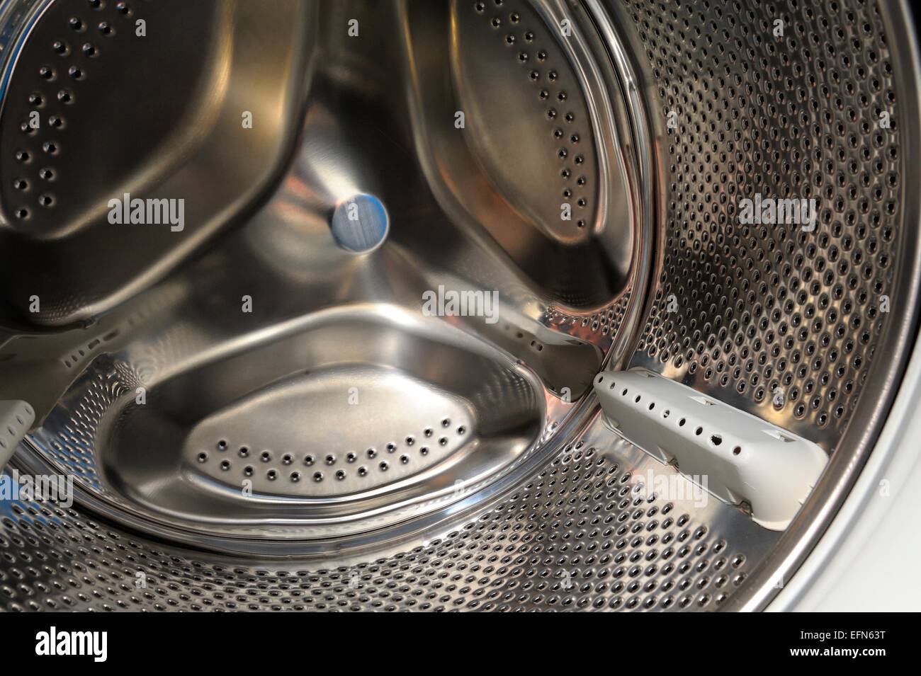 A chrome automatic washing machine drum close up Stock Photo Alamy