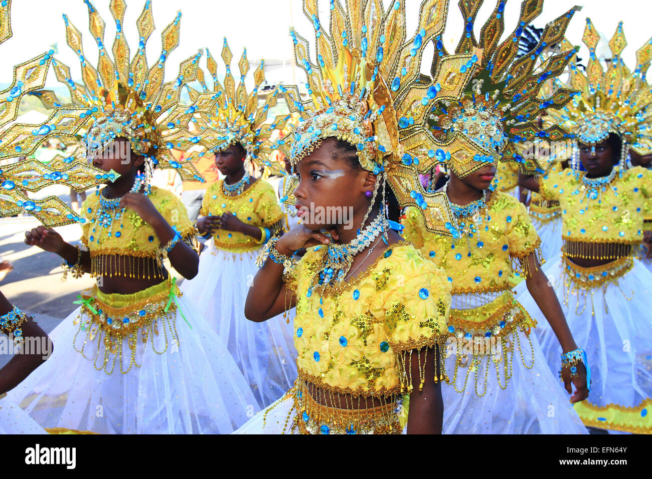 Young masqueraders perform in the Queen's Park Savannah during Red ...