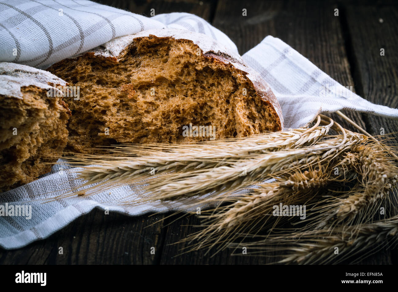 fresh white bread on wooden background Stock Photo - Alamy