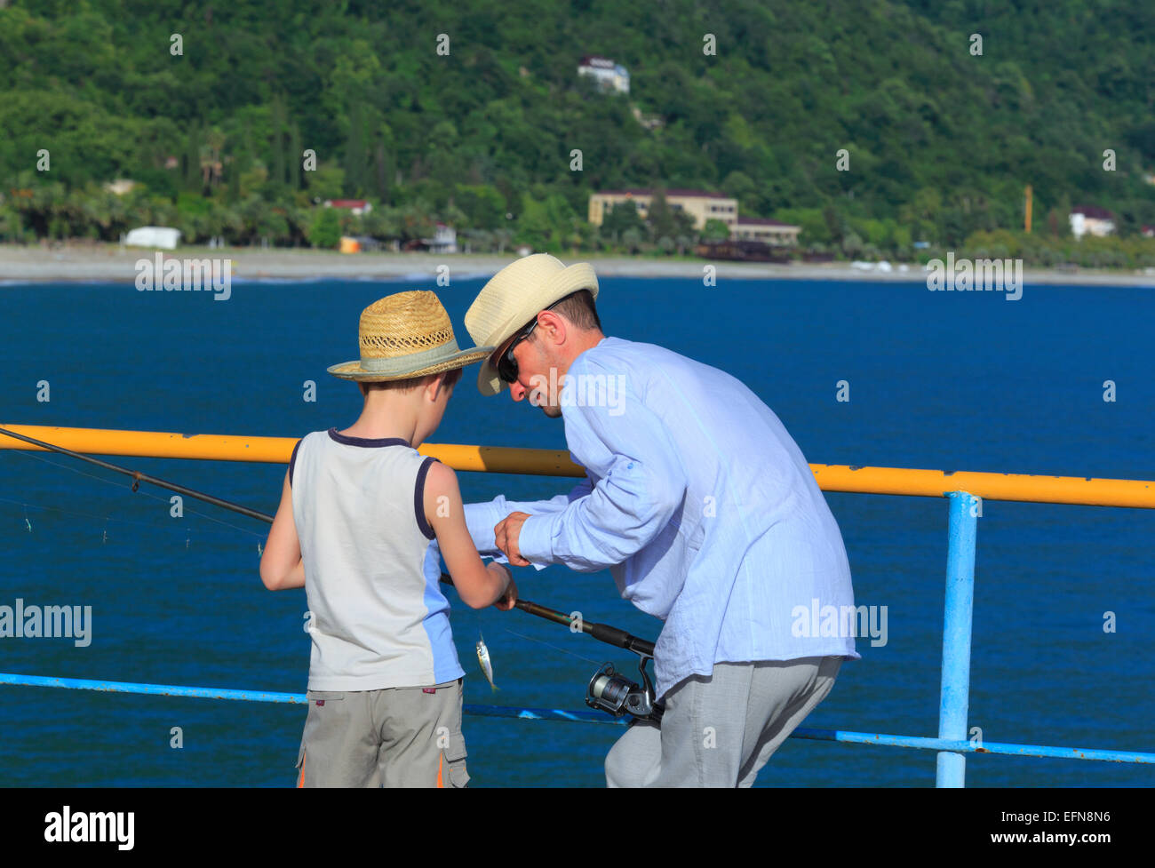 Father and the son fishing, Abkhazia, Georgia Stock Photo