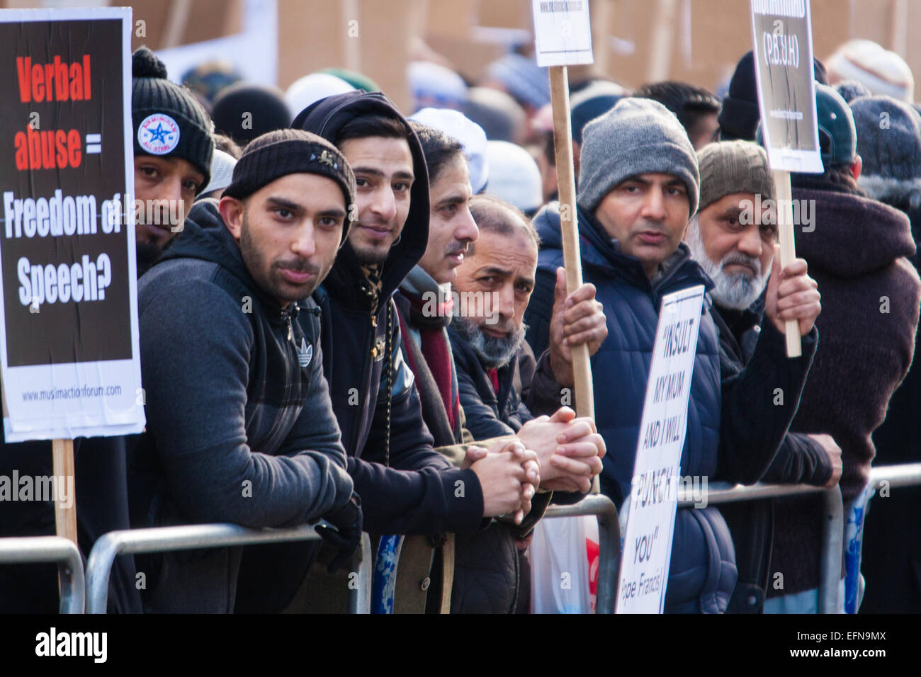 London, February 8th 2015. Muslims demonstrate outside Downing Street  'to denounce the uncivilised expressionists reprinting of the cartoon image of the Holy Prophet Muhammad'. Credit:  Paul Davey/Alamy Live News Stock Photo