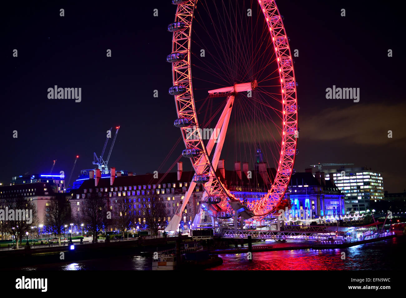 The London eye on Southbank at night Stock Photo