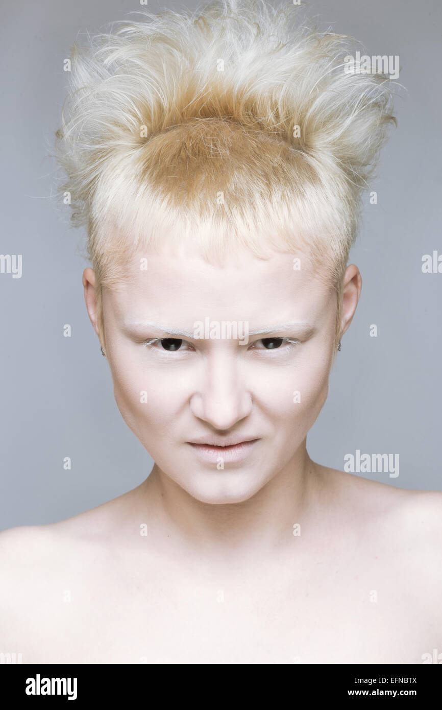 angry aggressive girl in black lenses. Stock Photo