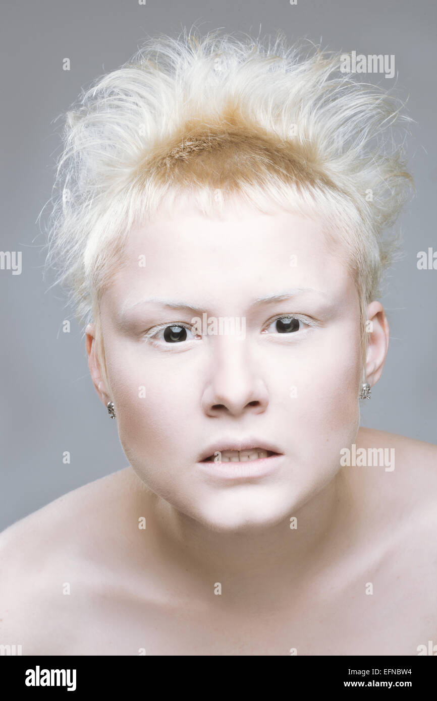 angry aggressive girl in black lenses. Stock Photo