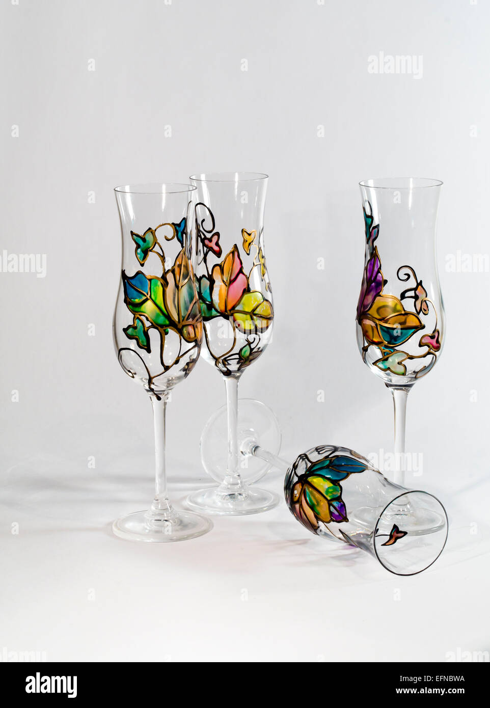 Colourful hand painted wine glasses, tulip shaped Stock Photo Alamy