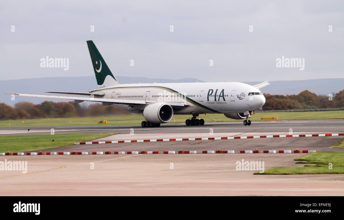 Pakistan International Airlines Boeing 777, taking off from Manchester International Airport. Stock Photo