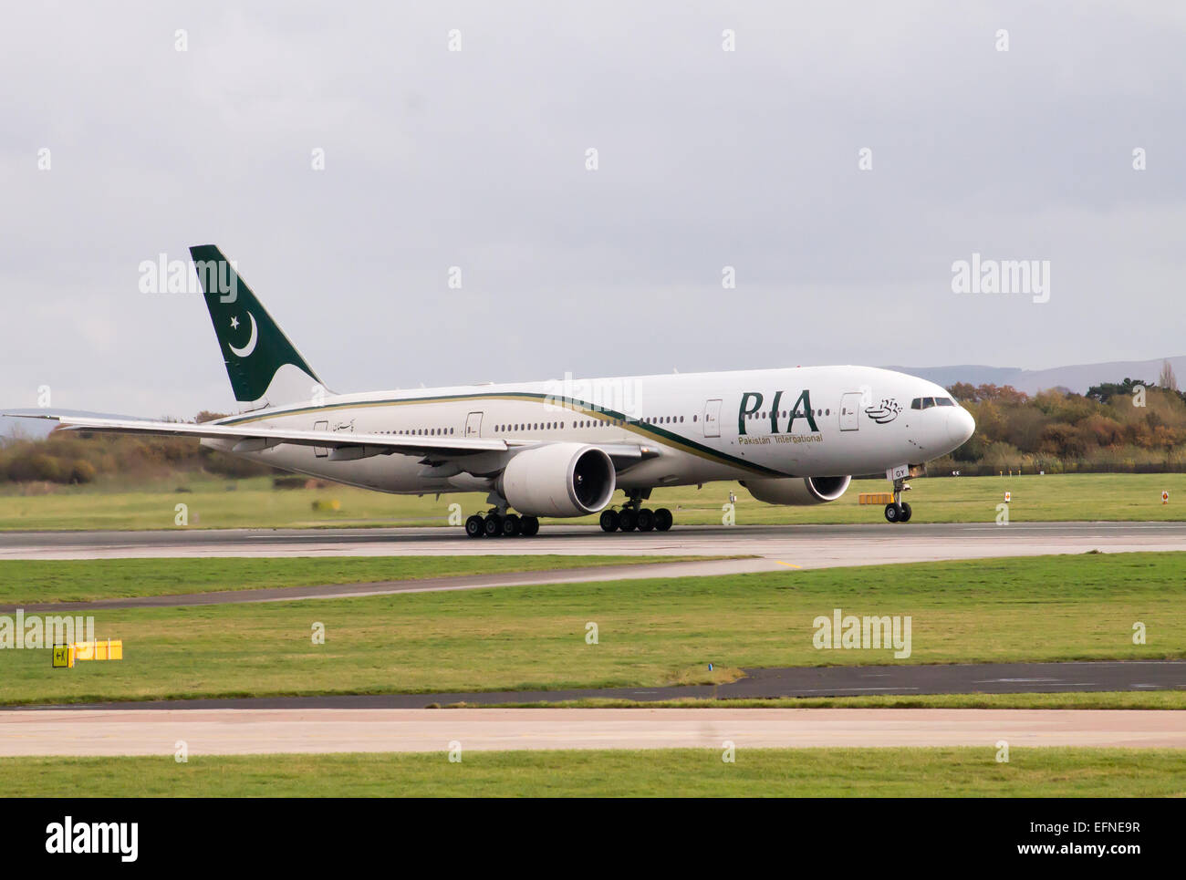Pakistan International Airlines Boeing 777, taking off from Manchester International Airport. Stock Photo