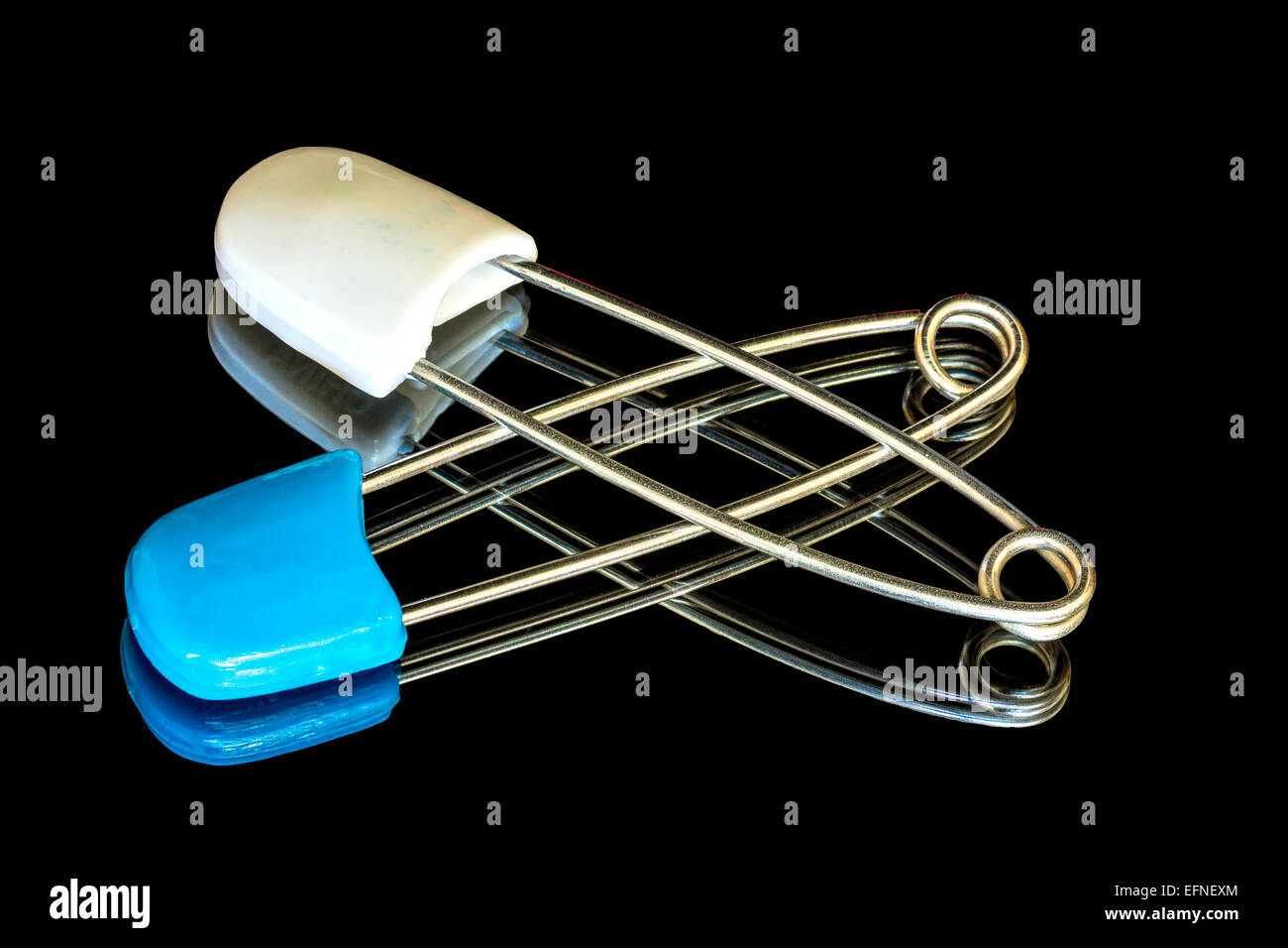 Blue and white tipped safety pins Stock Photo