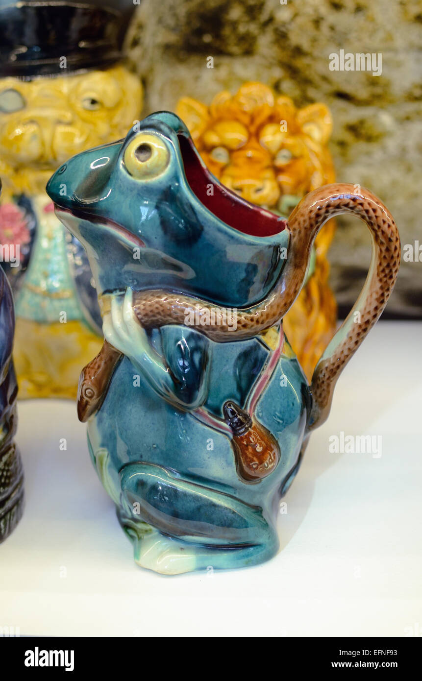 Face Jug Toby Jar or Water Pitcher in the Form of a Frog with a Snake for a Handle Stock Photo