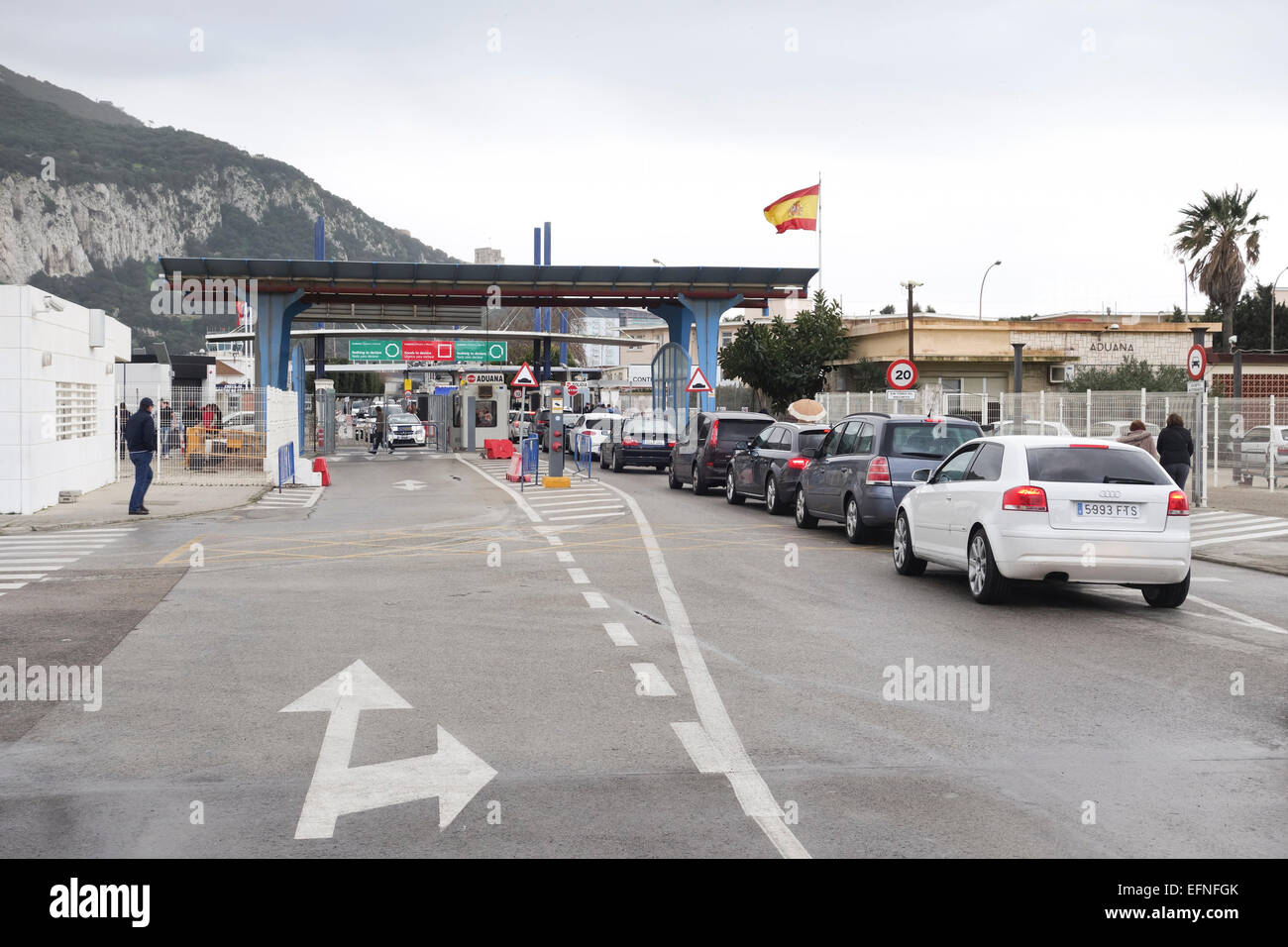 Gibraltar rock Cars queuing in front of border Spain, Gibraltar to pass customs. La Linea, Andalusia, Spain. Stock Photo