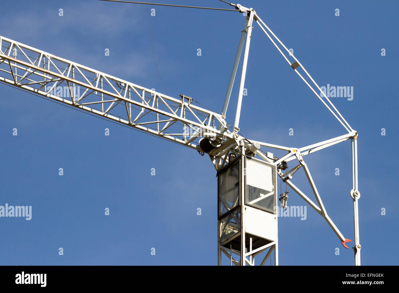 Crane on a blue sky background Stock Photo - Alamy