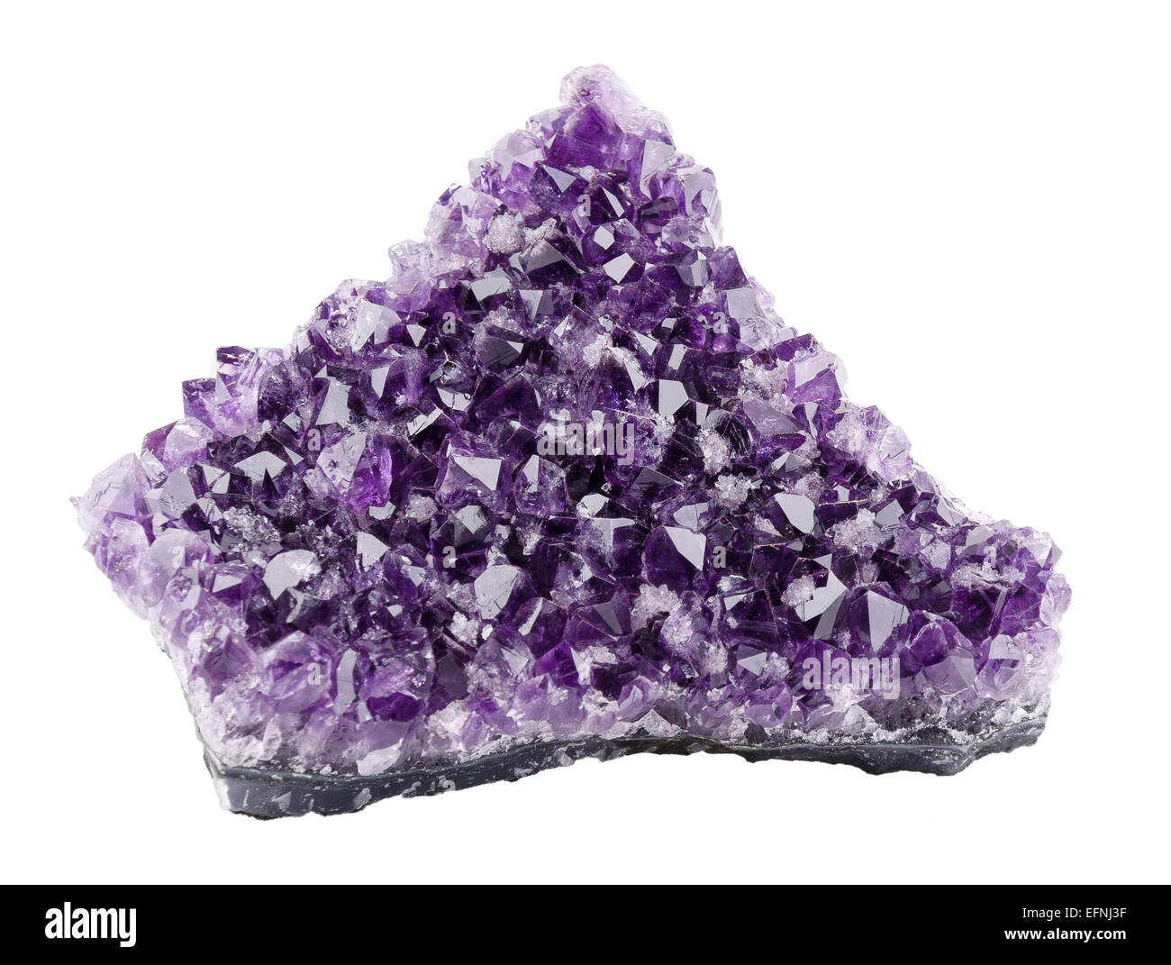 Amethyst over white background, a violet variety of quartz, often used in jewelry. Silica, silicon dioxide, SiO2. Stock Photo