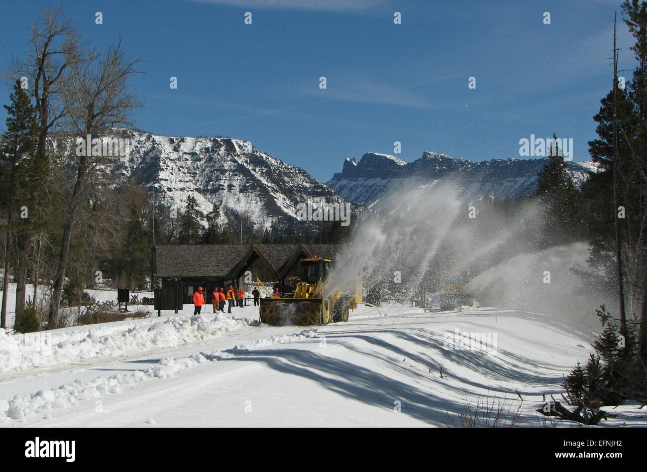Wyoming Department of Transportation rotaries clearing snow inside Yellowstone's East Entrance Stock Photo