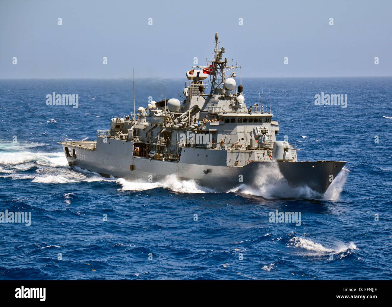 The Turkish Navy Salih Reis class frigate TCG Kemalreis maneuvers during NATO Maritime operations July 28, 2014 in the Atlantic Ocean. Stock Photo