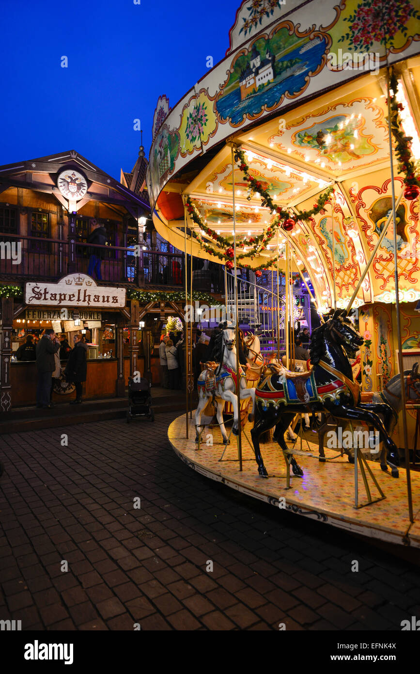 Merry-go-round In Cologne Christmas Market, Germany Stock Photo