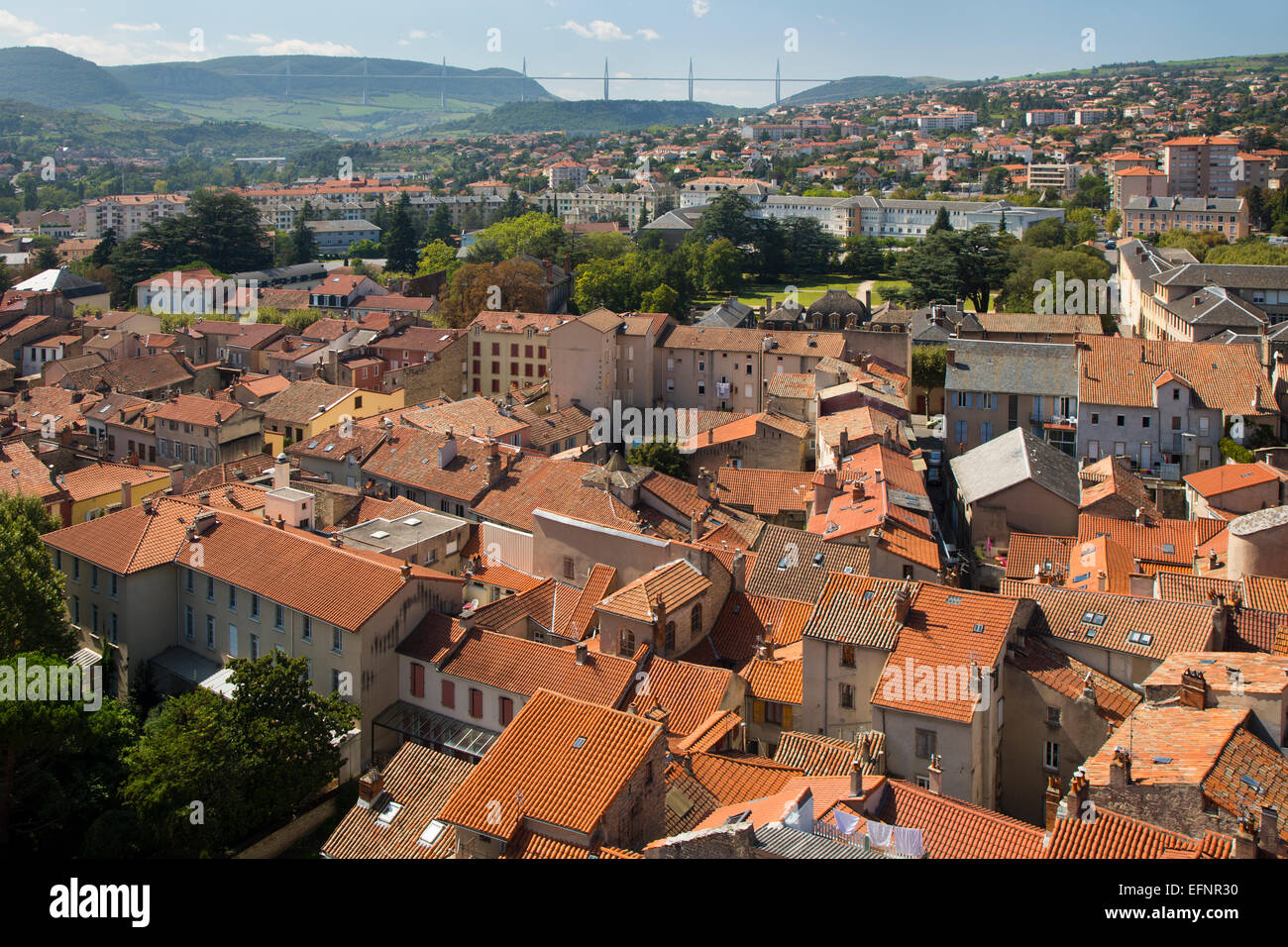 France, Aveyron, Midi-Pyrenees, Millau, cityscape view over the town centre from The Belfrey with Viaduc de Millau viaduct Stock Photo